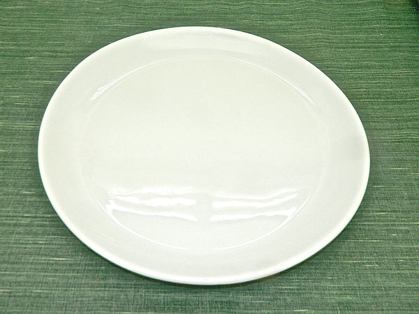 Small hand-thrown white porcelain steak platter