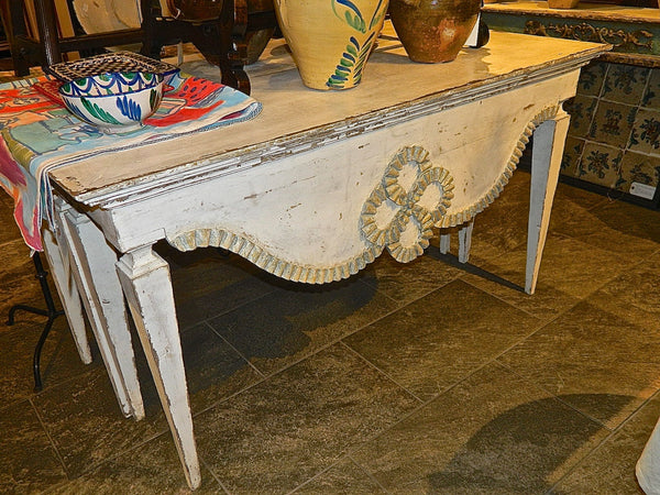 Pair of antique carved and scalloped front console tables