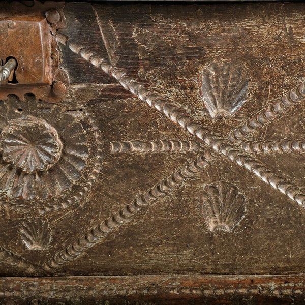 Antique scalloped skirt travel chest with carved shells of St. James, chestnut