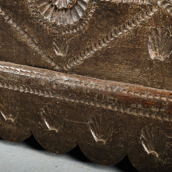 Antique scalloped skirt travel chest with carved shells of St. James, chestnut