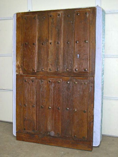 Antique studded pine plank wine cellar door