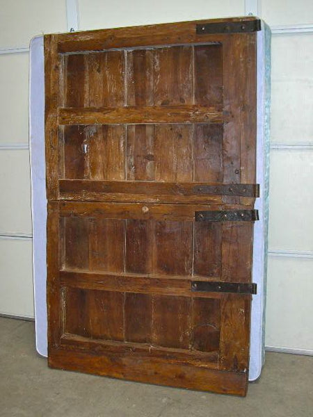 Antique studded pine plank wine cellar door