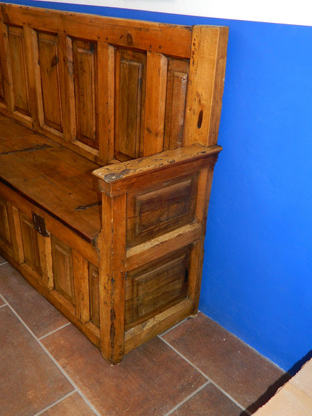 Antique L-shaped paneled Castilian choir corner bench, pine, walnut and poplar