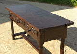 Antique three-drawer mast leg library table, oak and chestnut