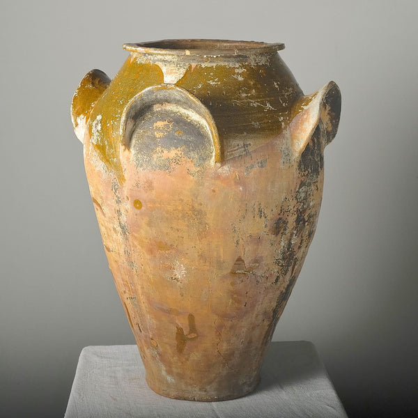 Antique semi-glazed four-handle “elephant ear” olive oil jar