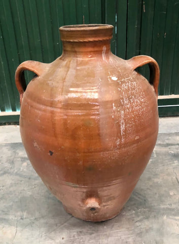 Antique glazed two-handle oil jug
