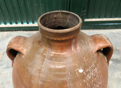 Antique glazed two-handle oil jug