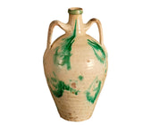 Antique two handle green and cream colored water jug