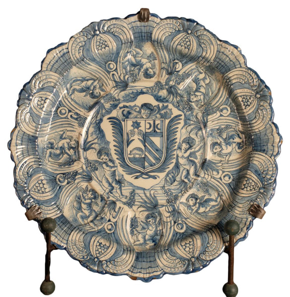 Large antique scalloped heraldic platter with cherubs
