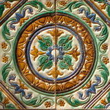 Framed antique enameled Andalusian tiles