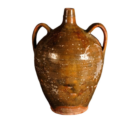 Antique glazed two-handle olive green liquor jug
