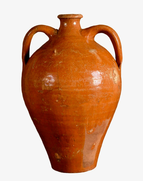 Antique two-handle rust colored glazed liquor jug
