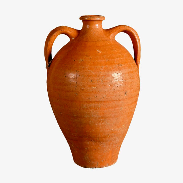 Antique two-handle glazed rust colored liquor jug