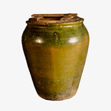 Antique small glazed green olive jar with wooden top