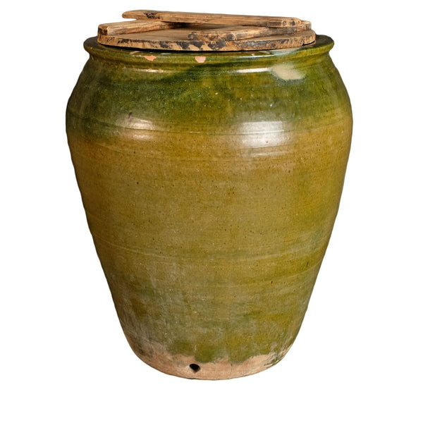 Antique small glazed green olive jar with wooden top
