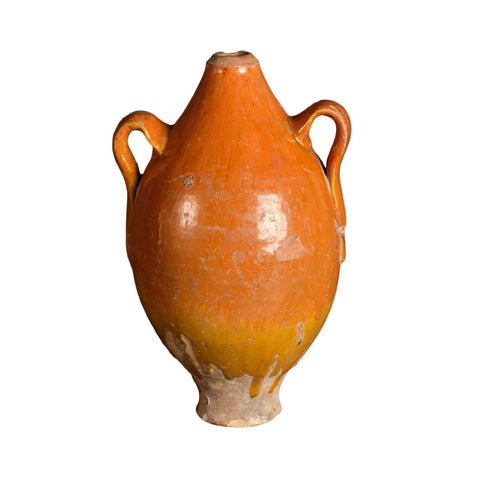 Antique glazed two-handle liquor jug, rust