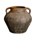 Antique incised two-handle pot with wire mesh