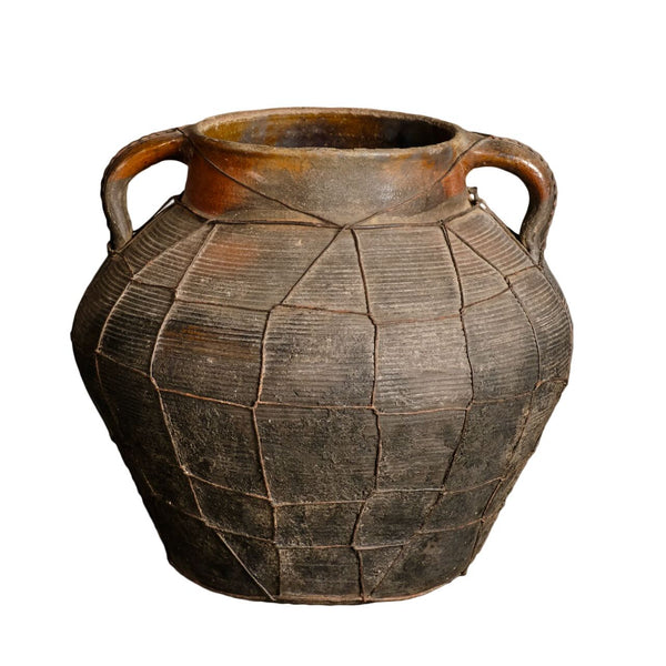 Antique incised two-handle pot with wire mesh