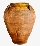 Antique large four-handle semi-glazed olive oil jar
