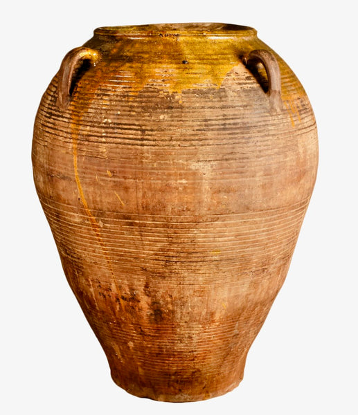 Antique large four-handle semi-glazed olive oil jar