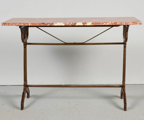 Antique iron bistro table with red marble top