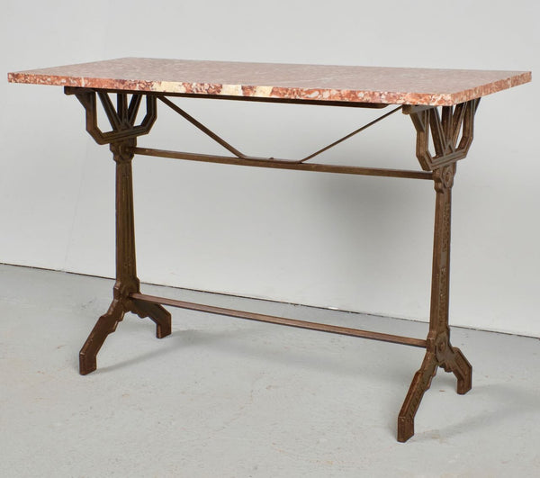 Antique iron bistro table with red marble top