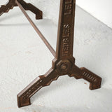 Antique iron bistro table with red marble top
