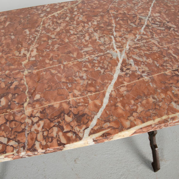 Antique iron bistro table with red marble top
