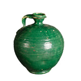 Antique single-handle glazed green water jug