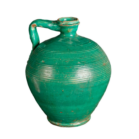 Antique single-handle glazed green water jug