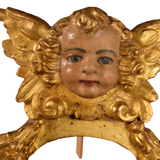 Antique carved, gilt and polychromed angel head with pomegranates