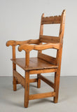 Antique carved Pyrenees arm chair, pine