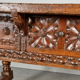 Antique heavily carved turned leg three-drawer library table, walnut