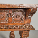 Antique heavily carved turned leg three-drawer library table, walnut