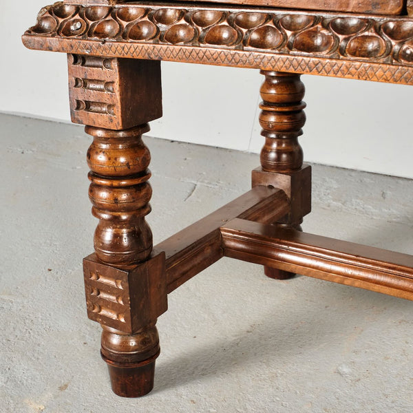 Antique heavily carved turned leg three-drawer library table, walnut