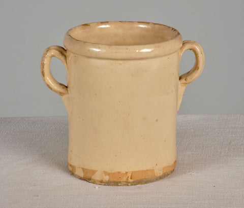 Antique two-handle cream colored butter jar
