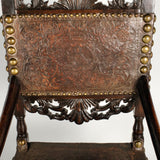 Antique carved tooled leather Spanish colonial arm chair