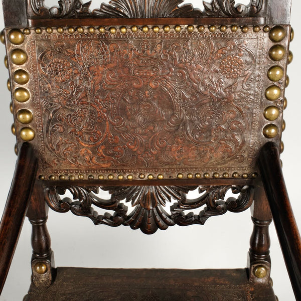 Antique carved tooled leather Spanish colonial arm chair