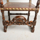 Antique carved tooled leather Spanish colonial arm chair