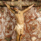 Antique carved and polychromed canopied crucifixion
