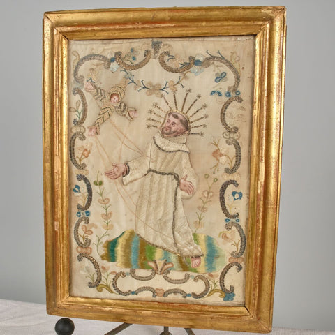 Antique framed embroidered scene of the “Stigmata of St. Francis”