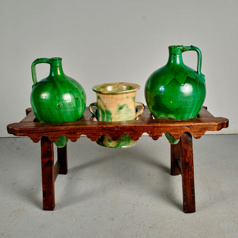 Antique three hole water jug stand with glazed jugs