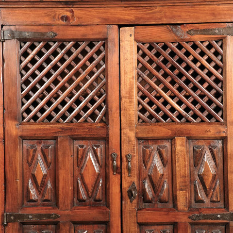 Small antique two-door latticework cabinet, pine and walnut