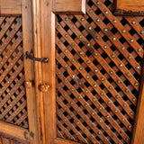 Antique latticework door pharmacy cabinet, pine and cedar