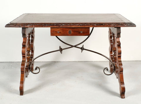 Antique carved edge lyre leg table with iron stretchers, mixed fruitwoods