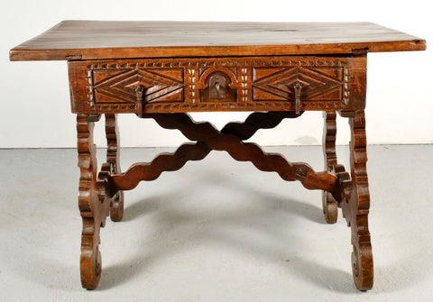 Antique carved lyre leg table with drawer and wooden stretchers, walnut