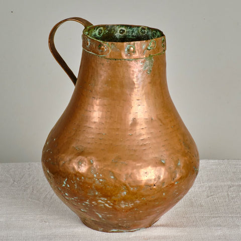 Large antique single handle copper oil pitcher