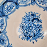 Antique painted and glazed blue and white “Manises” wash basin with floral motifs