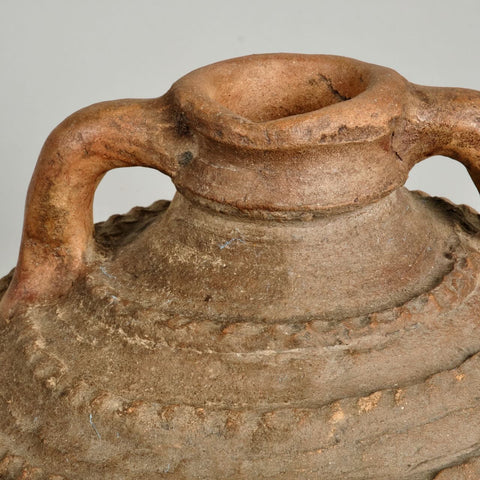 Antique crimped terracotta oil jar on iron base