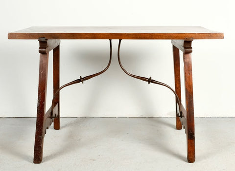 Antique trestle leg writing table with iron stretchers, walnut